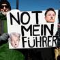 Ein Mann trägt ein Schild mit der Aufschrift „Nicht mein Führer" während eines Protests in der Nähe des Capitol Reflecting Pool.